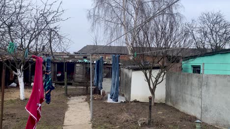 clothes left drying on the line but everyone gone from the ukrainian countryside due to war with russia