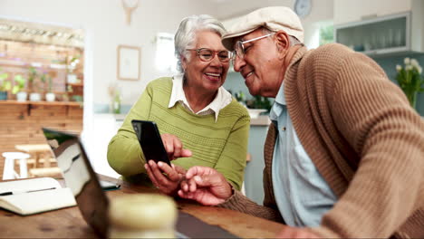 senior couple using technology at home