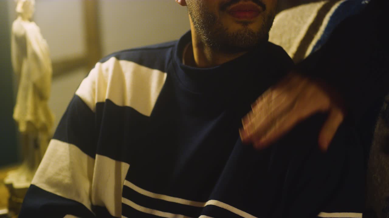 Man gets pat on shoulder and says bye.