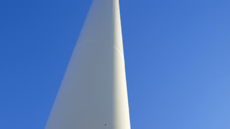 engineer standing on a wind mill 4k