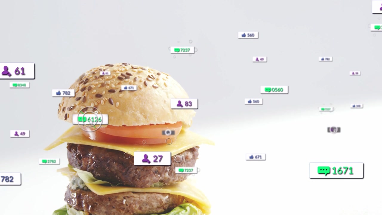 Data badges appearing stacked burger emerging in studio, cursor circling counters for marketing