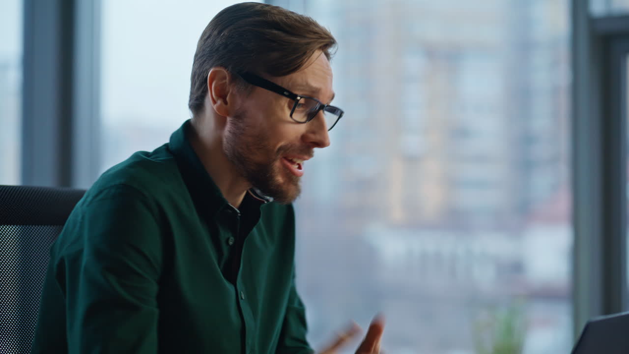 Company leader greeting webcam laptop starting video call in office closeup