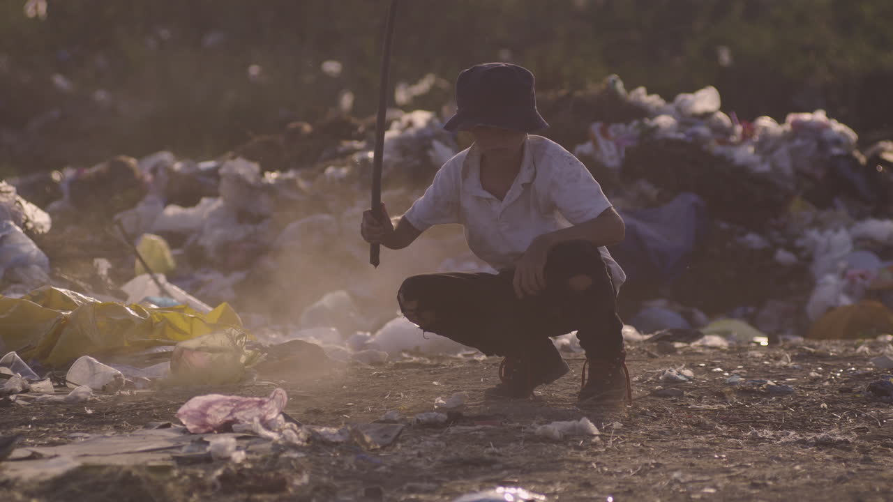 Child scavenging in a garbage dump
