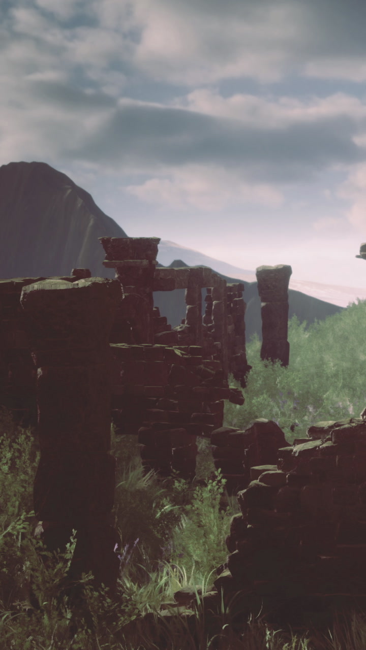 Ruins on a mountain overlooking valleys with clouds and sunlight at dawn