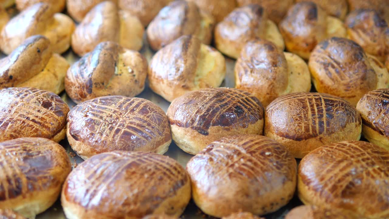 Rows of Freshly Baked Golden Pastries