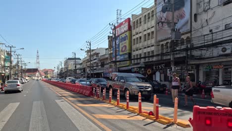 vehicles moving through a bustling city street