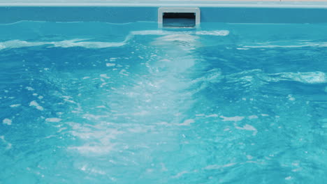 the countercurrent in the pool is a powerful flow of water. a swimmer can swim in a small pool