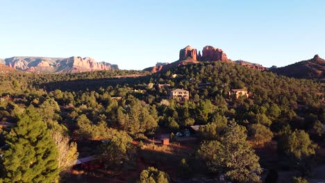 small residential town of sedona in america in early morning, aerial drone shot