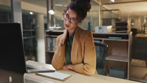 woman with neck pain at computer