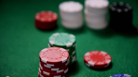 Playing-cards-and-casino-chips-on-poker-table-4k