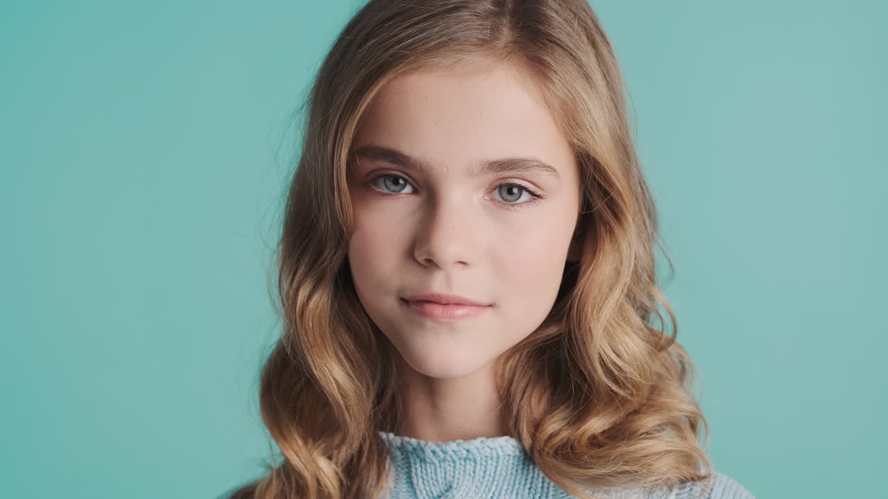 Teenage Caucasian girl looking at the camera.