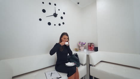 woman sitting in waiting room. view of patient sitting in waiting room