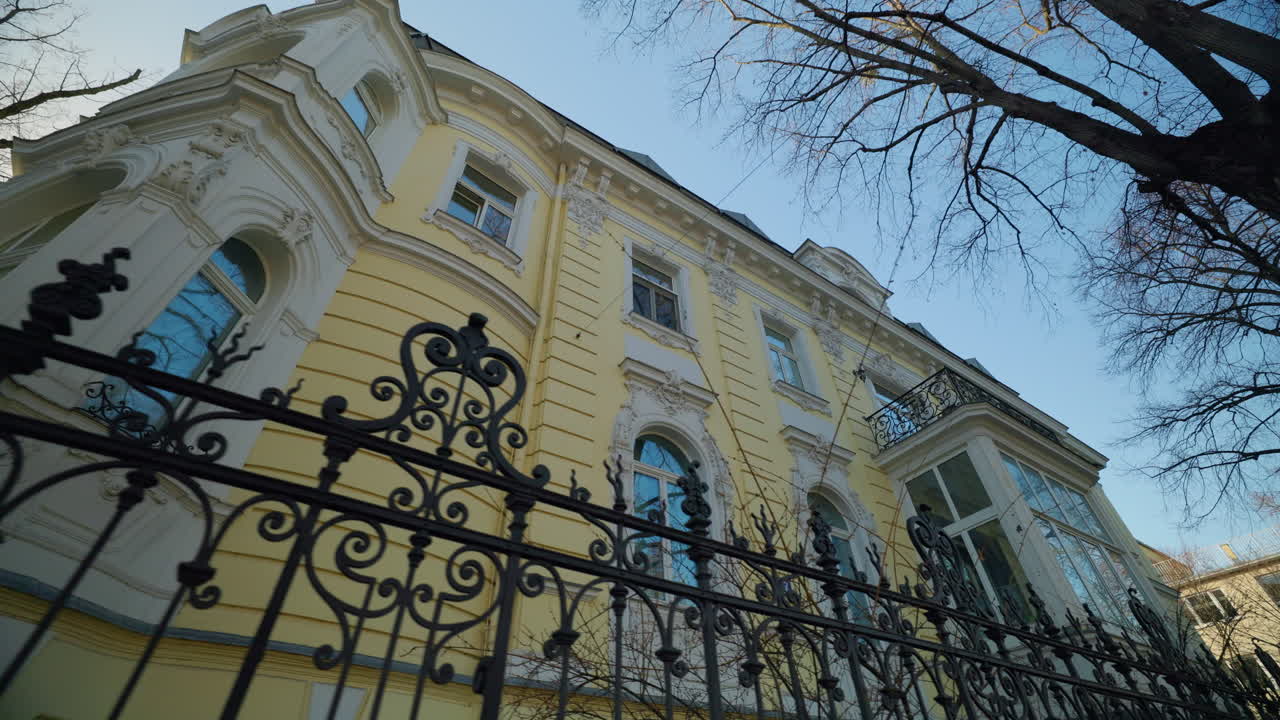 Ornate Building with Iron Fence