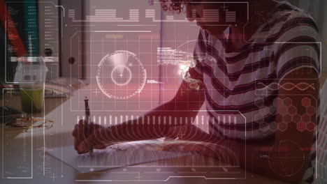 Animation of data processing and diagrams over biracial woman taking notes