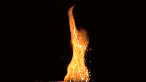 Large-flame-with-sparks-on-black-background