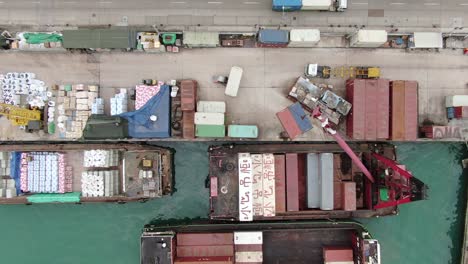 small feeder type container barges operating in hong kong pillar point dock