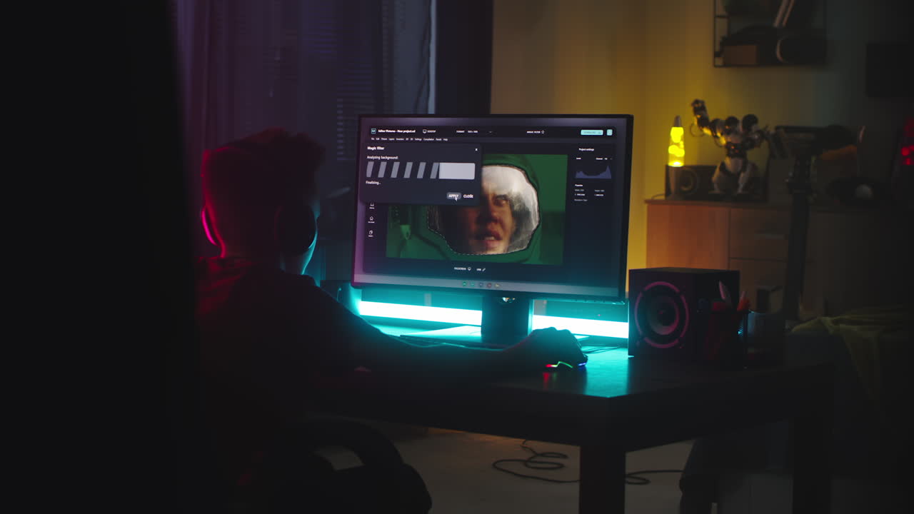 Teenager Retouching Photo at Night