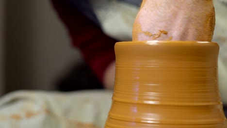 potter makes a jug