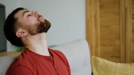 sick man sitting in the living room