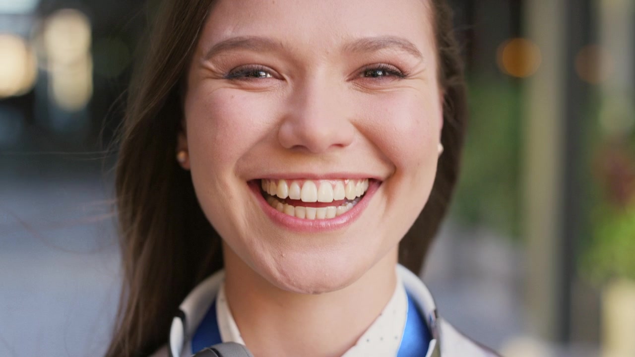 Close-up Portrait of a Smiling Young Woman