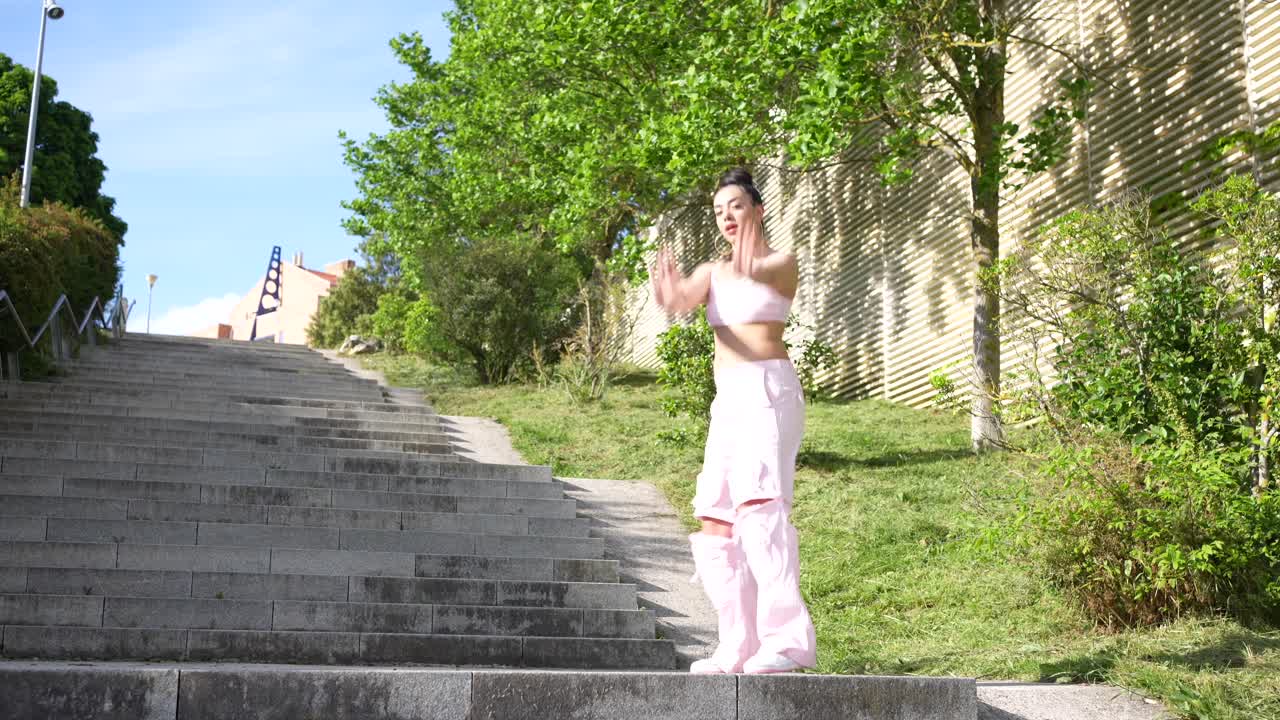 Woman Dancing on Urban Stairs