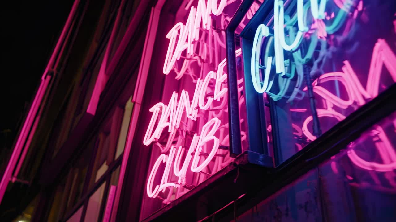 Glowing neon lights illuminating a dance club sign on a building exterior, creating an energetic and vibrant atmosphere that captures the essence of urban nightlife