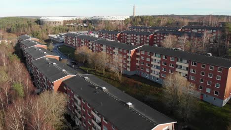 aerial flyover rows of apartment buildings in gothenburg suburbia, sweden