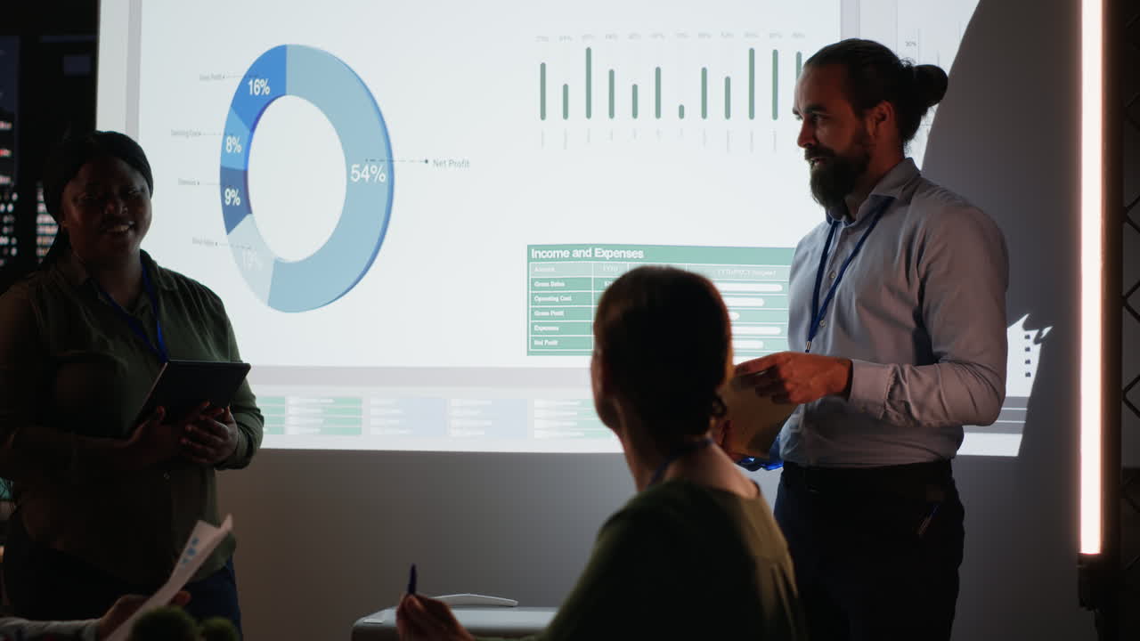 Multiethnic team of workers discuss the financial situation of the company