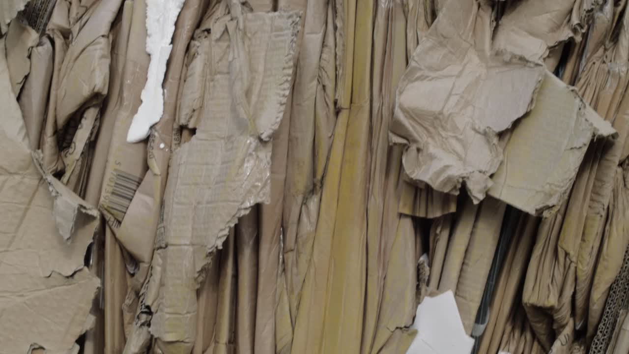 Cardboard boxes waste close up tilting shot