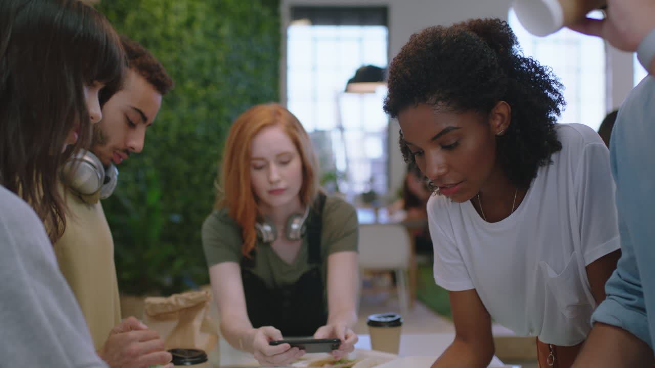 young business people meeting software developer team design mobile phone application diverse group brainstorming sharing creative ideas for communication app