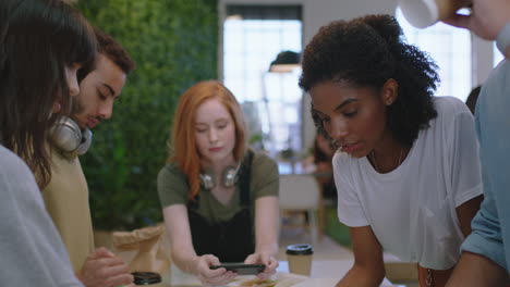 young business people meeting software developer team design mobile phone application diverse group brainstorming sharing creative ideas for communication app