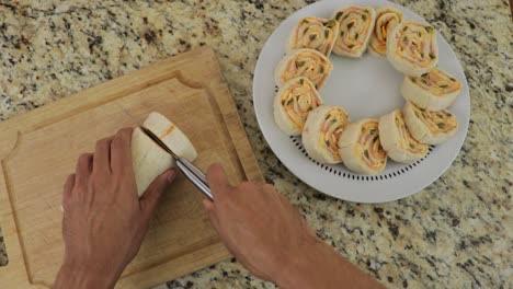 Cutting-rolls-out-of-a-wrap,-traditional-south-american-food