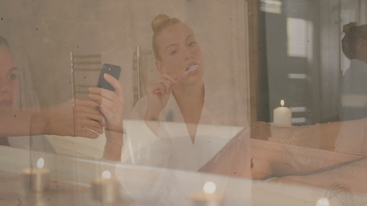 Brushing teeth, woman using smartphone in relaxing bathroom with animation