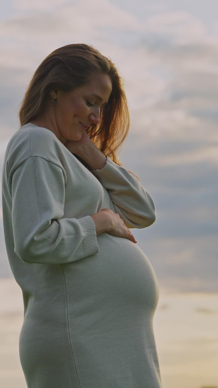 Pregnant woman outdoors