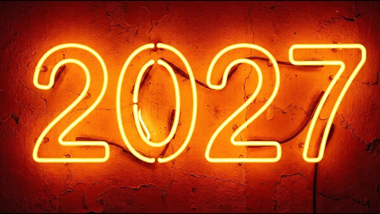 Insegna al neon che mostra l'anno 2027 su una parete texturizzata