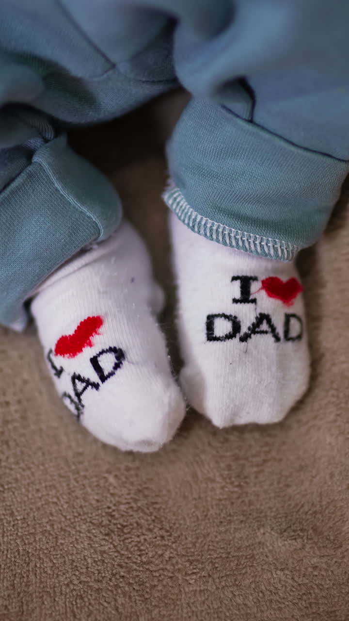 Baby Feet in I Love Dad Socks