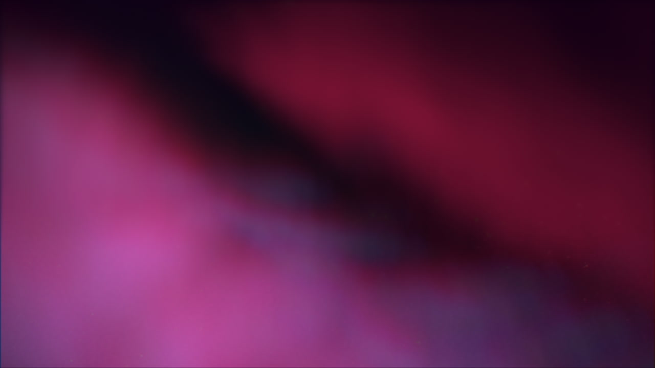 un borrón arremolinado de colores púrpura y azul creando un movimiento dinámico