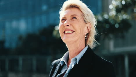 face, wind and a business woman in the city