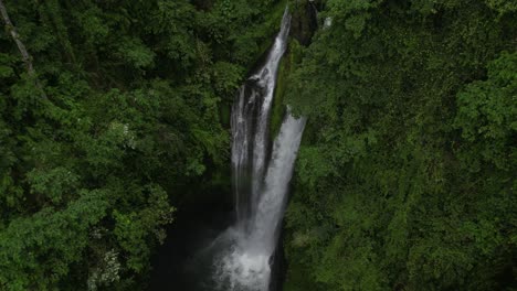 aling-aling waterfall from above on an overcast morning in bali, indonesia