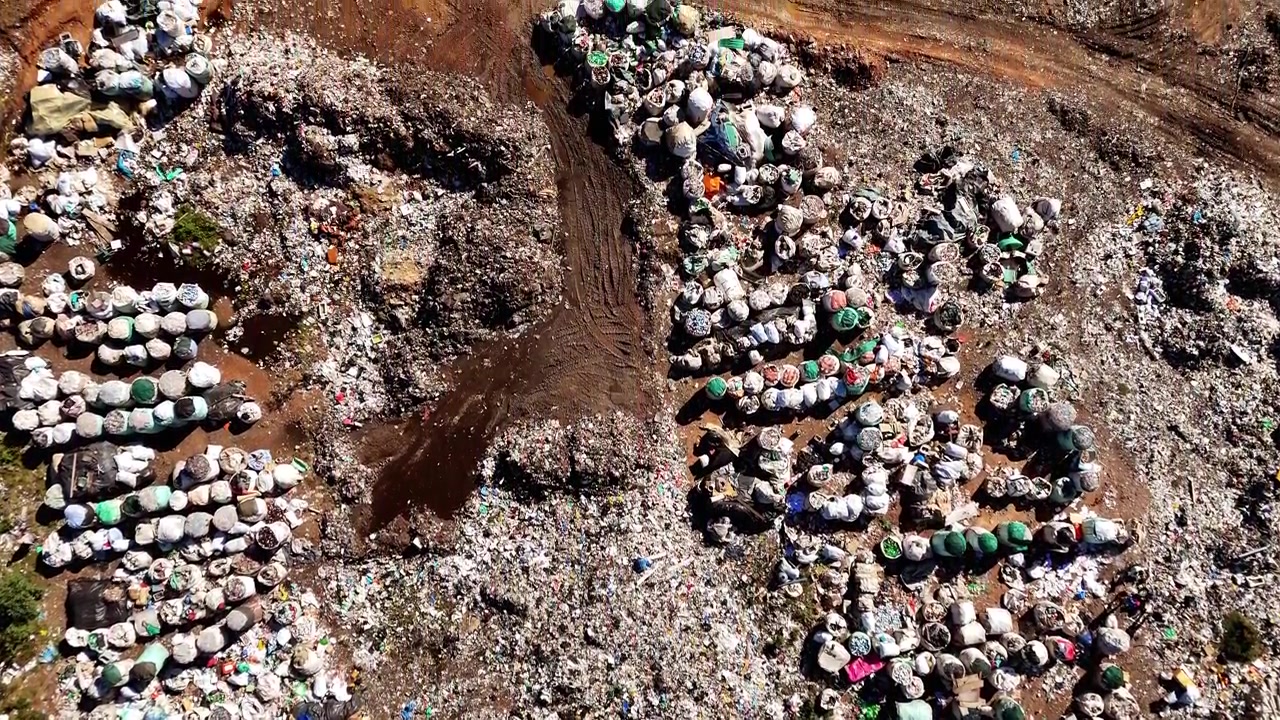 Drone footage of rubbish dump and recycling site in rural South Africa