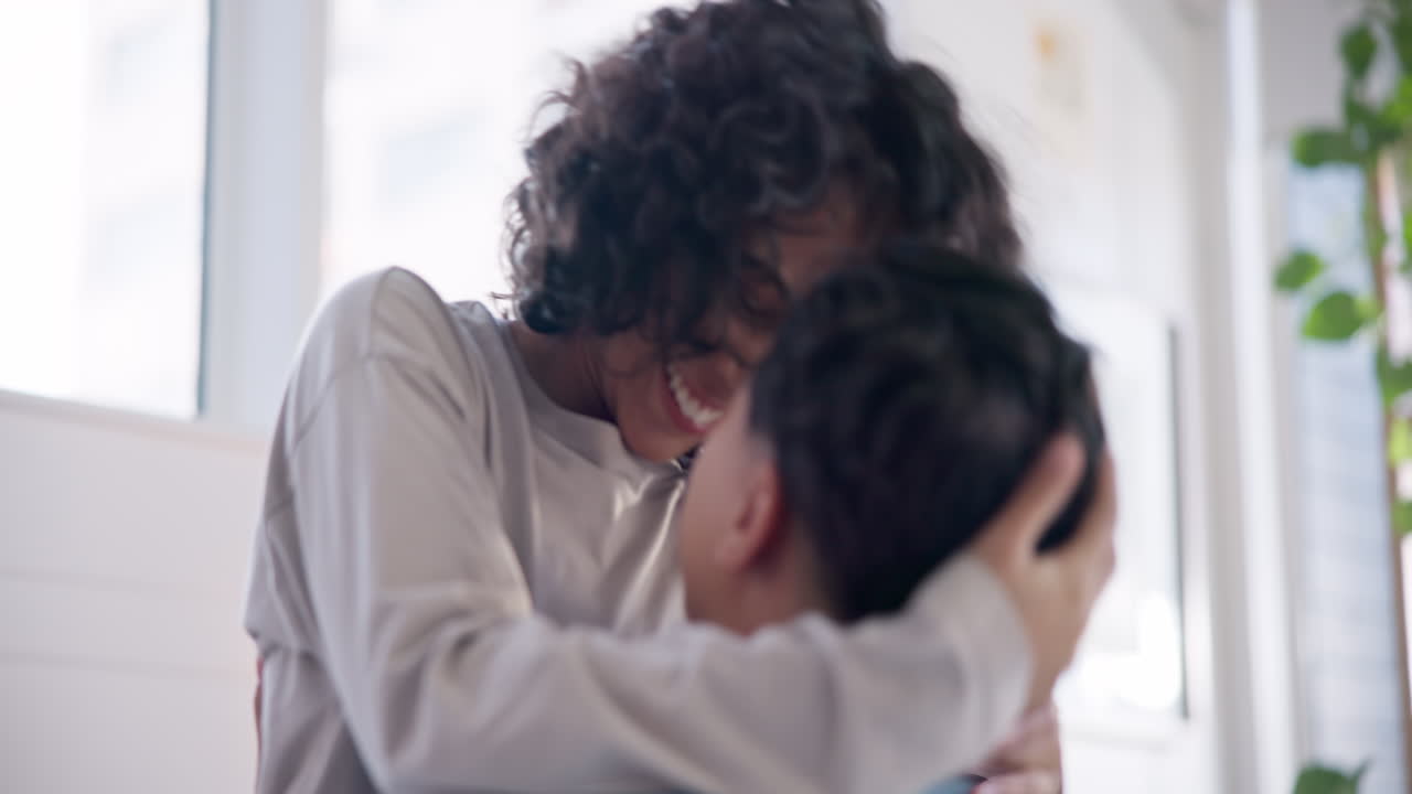 Lesbian couple, happy and women kiss in home