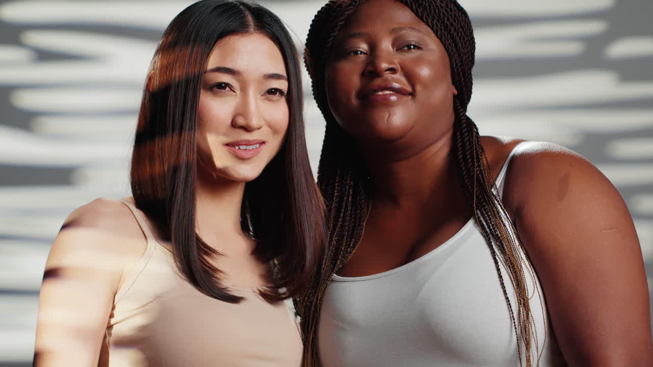 Diverse women smiling together