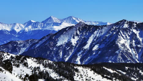 vail pass colorado aerial drone landscape i70 copper mountain silverthorne frisco grays and torreys tenmile peak sunny winter morning fresh snow blue sky rocky mountains continental divide circle left