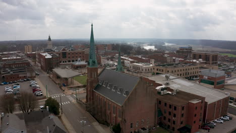 Historic-old-Neo-Gothic-church-steeple-on-a-sunny-day-in-a-small-town