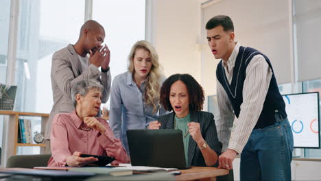 a group of business people having a serious meeting in an office.