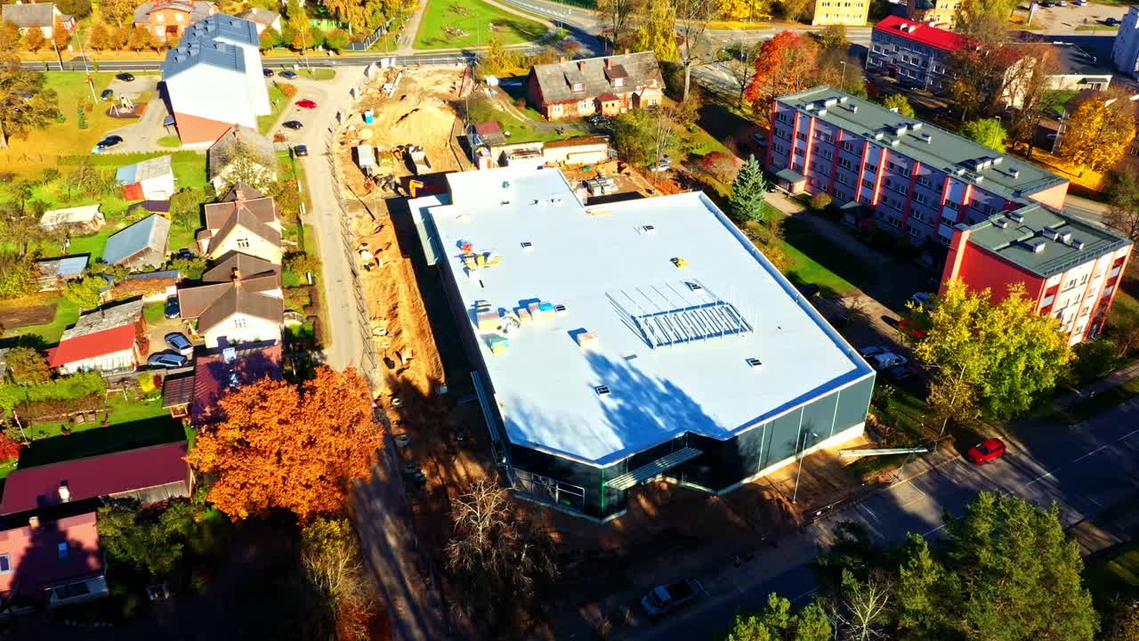 Building new Commercial building site showing modern architecture within expanding residential area