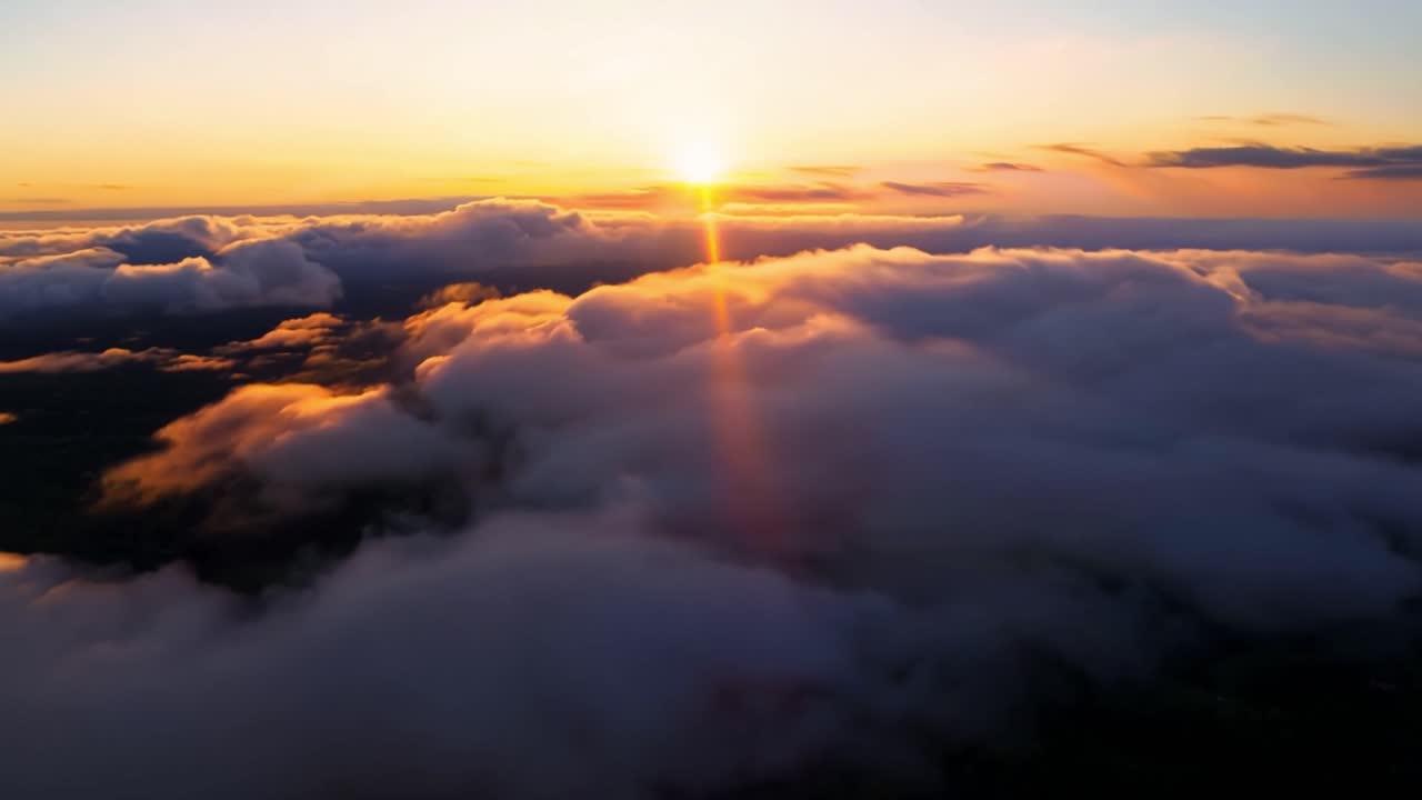 Golden Sunset Over the Clouds
