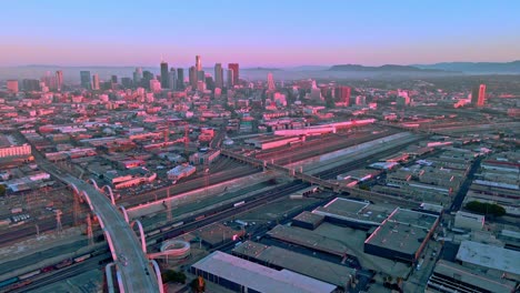 Downtown Los Angeles sixth street bridge morning, slow drone descent from high angle