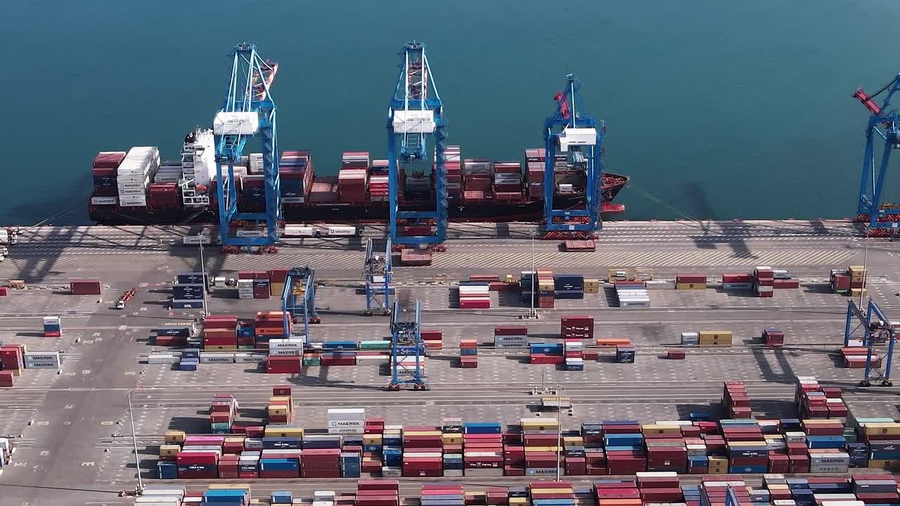 Shipping containers being loaded at the port in Accra, Ghana during the day