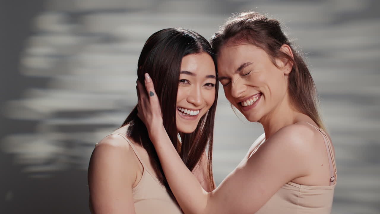 Two women sharing an intimate moment of love and laughter